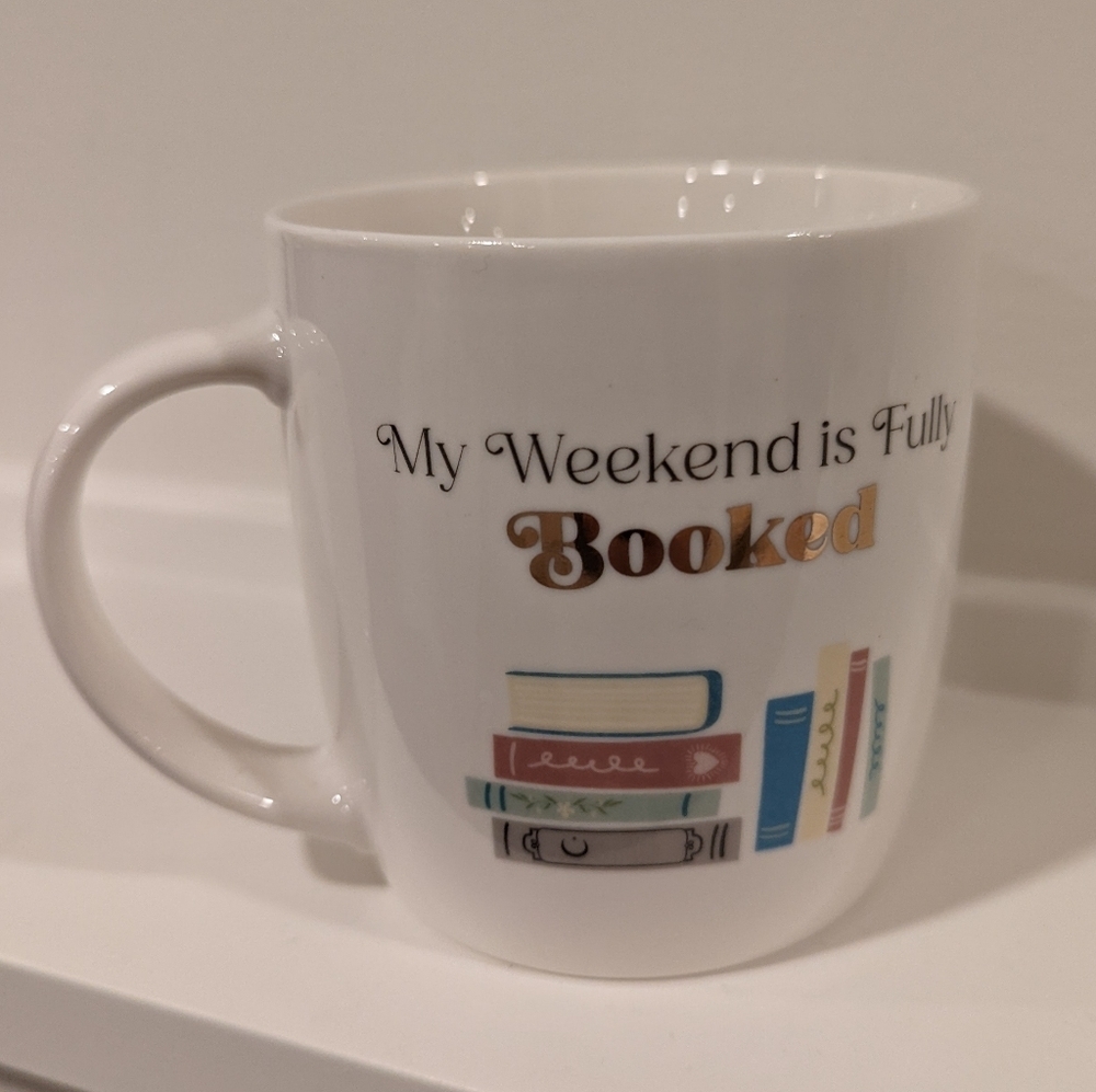 Charming White Mug with Book Design
